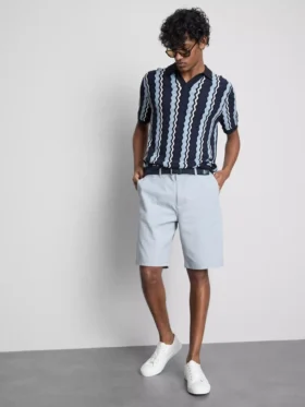 Strikket poloshirt med strukturerede striber