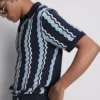 Strikket poloshirt med strukturerede striber