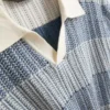 Strikket poloshirt med strukturerede striber