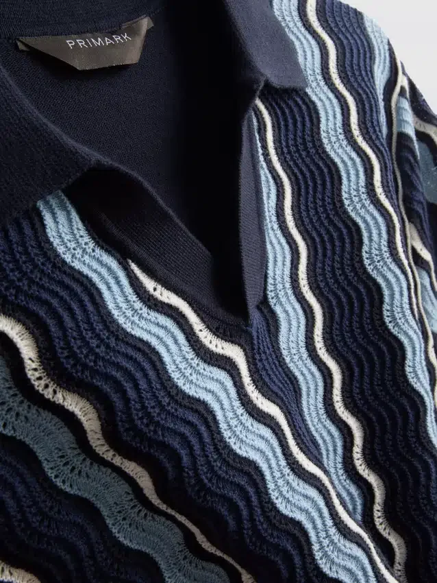 Strikket poloshirt med strukturerede striber