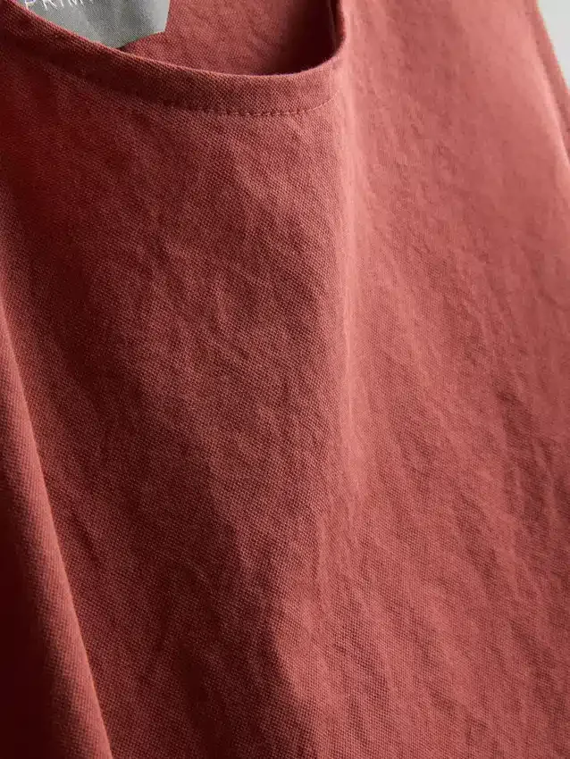 Strikket tanktop med bindebånd i siden