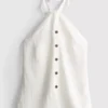 Struktureret halterneck-top med knapper