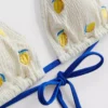 Struktureret trekantet bikini-top med citronmotiv