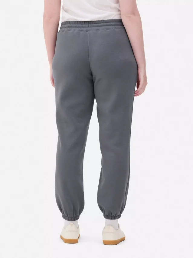 Sweatpants med manchetter og print