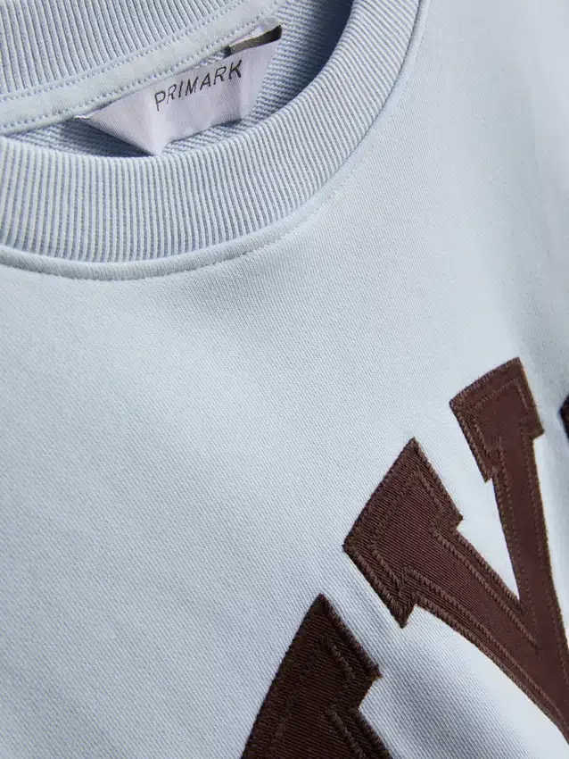 Sweatshirt med drop-sleeves i bomuldsrig NYC-stil