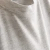 T-shirt med påsyet lomme og lang pasform