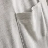 T-shirt med påsyet lomme og lang pasform
