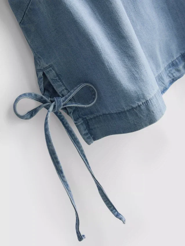Tanktop i bomuldsdenim med bindebånd i siden