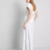 The Edit-linnebluse med V-udskæring og krydsning