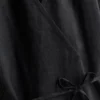 The Edit-linnebluse med V-udskæring og krydsning