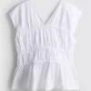 The Edit poplin-top med rynket V-hals