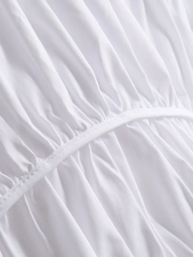 The Edit poplin-top med rynket V-hals