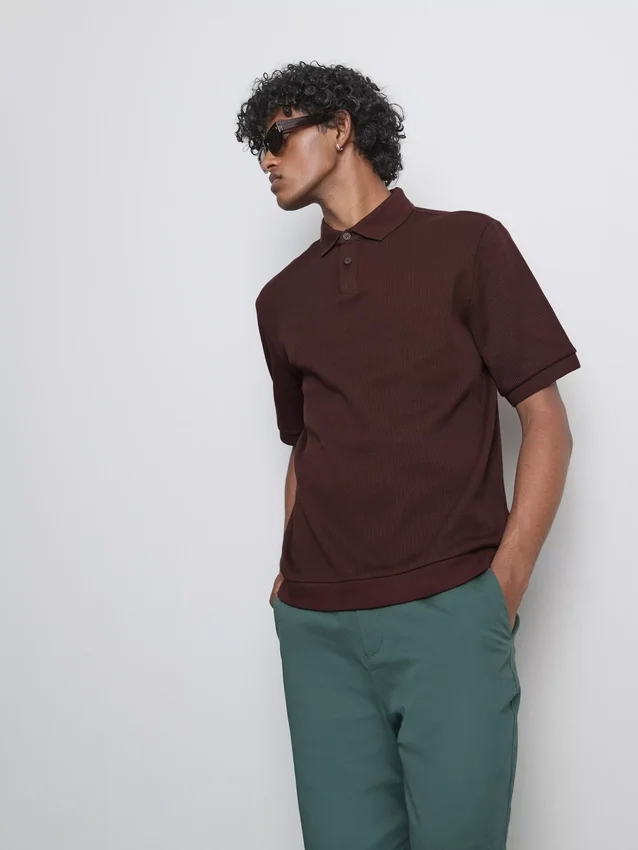 The Edit ribbet poloshirt