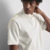 The Edit ribbet poloshirt