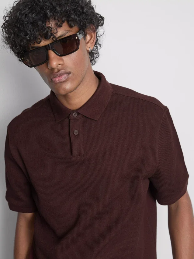 The Edit ribbet poloshirt