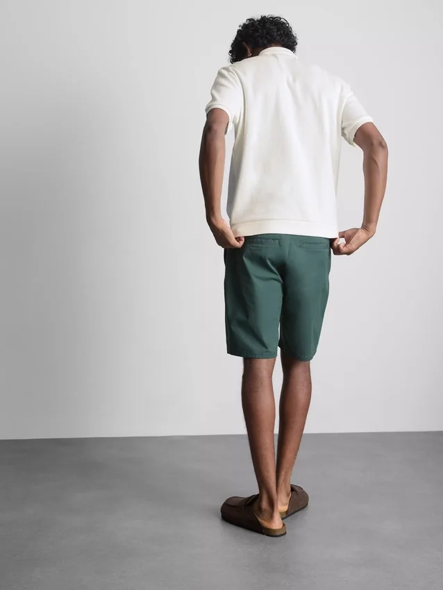 The Edit ribbet poloshirt
