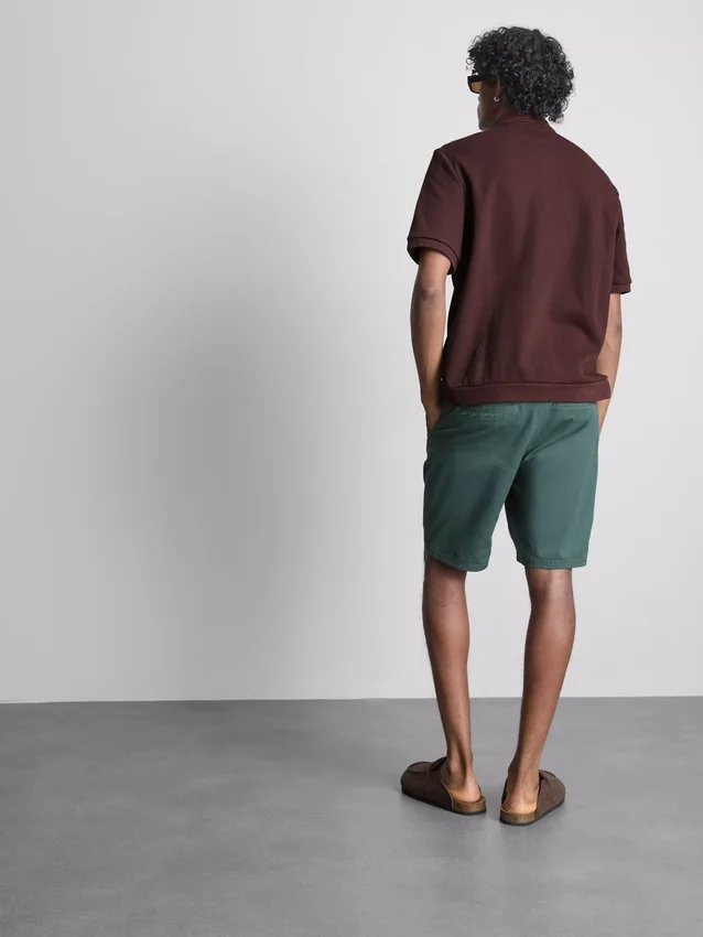 The Edit ribbet poloshirt