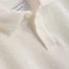 The Edit ribbet poloshirt