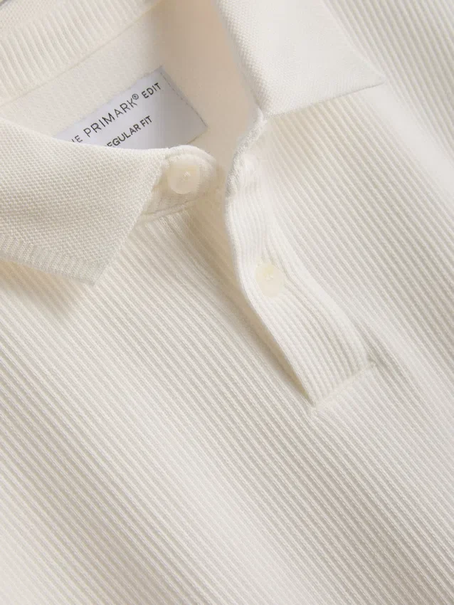 The Edit ribbet poloshirt