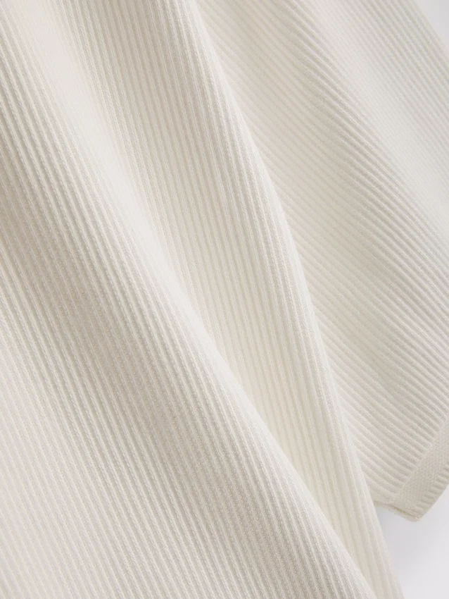 The Edit ribbet poloshirt