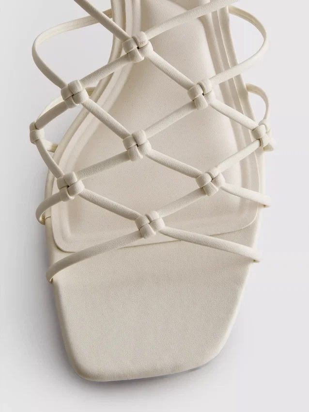 The Edit-sandaler med flettede stilethæle