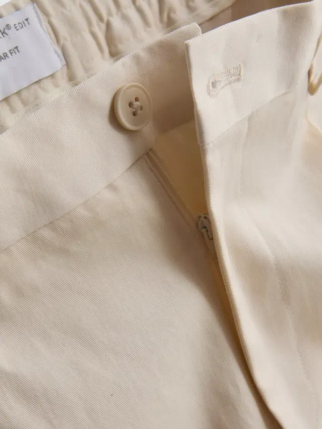 The Edit slim fit-bukser med peached-finish