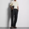 The Edit strikket poloshirt