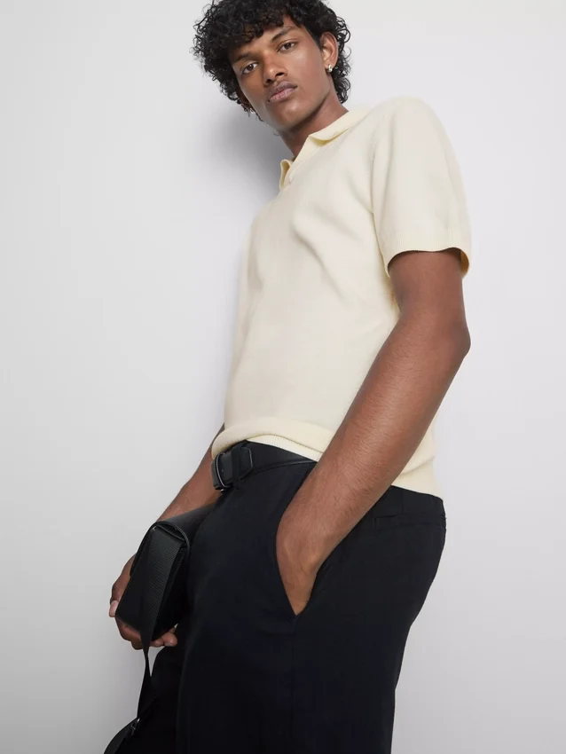The Edit strikket poloshirt