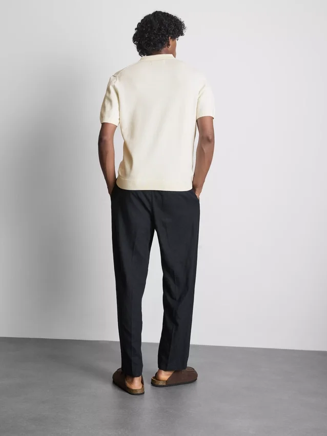 The Edit strikket poloshirt