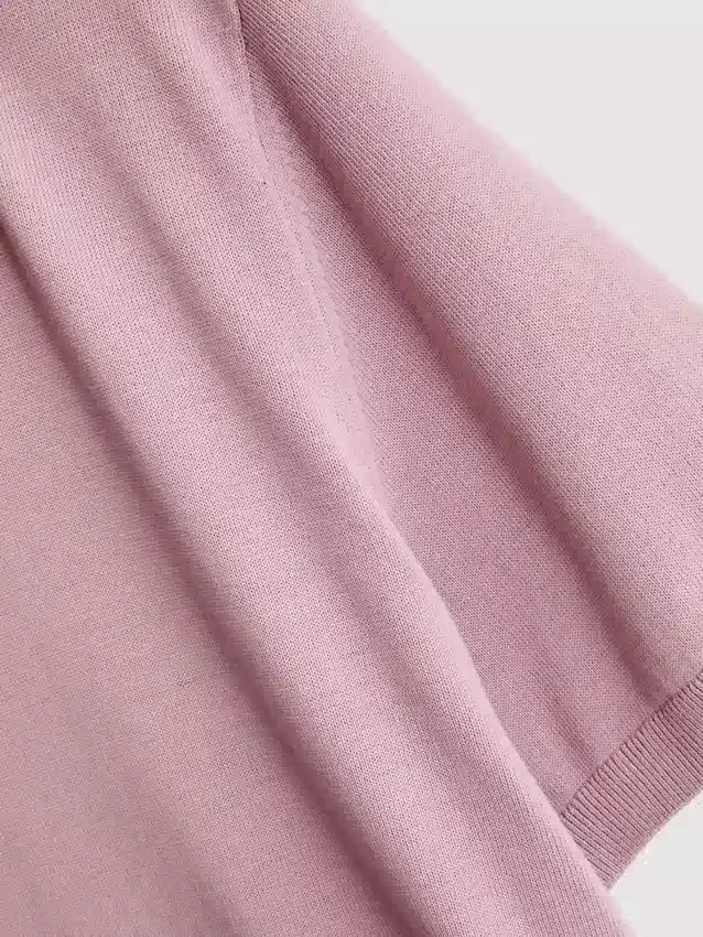 The Edit strikket poloshirt
