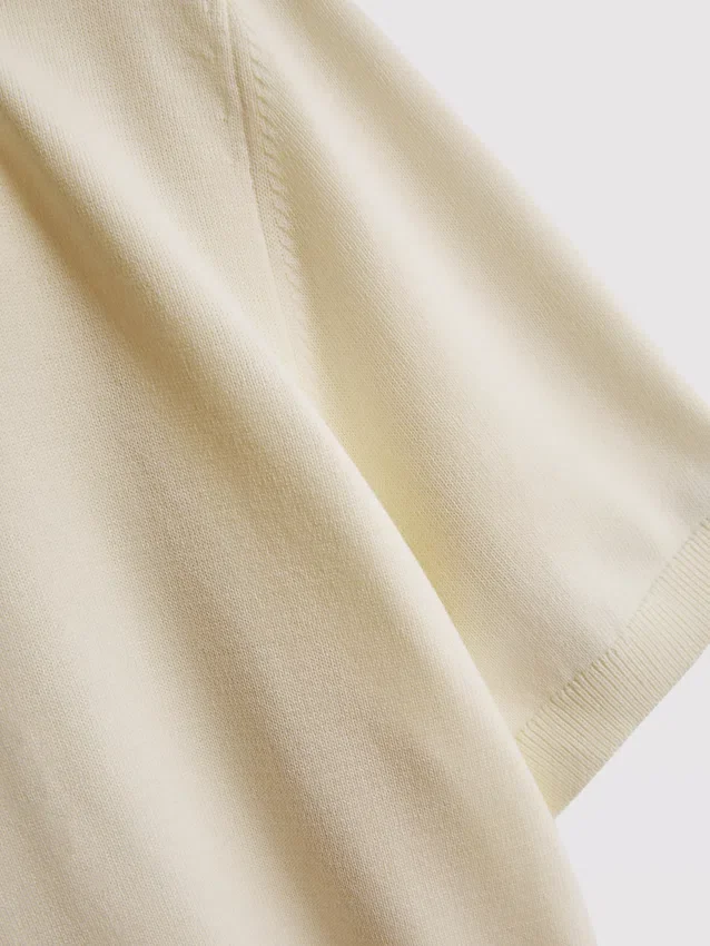 The Edit strikket poloshirt