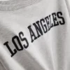 The Primark Scene | Sweatshirt med slogan og bare skuldre