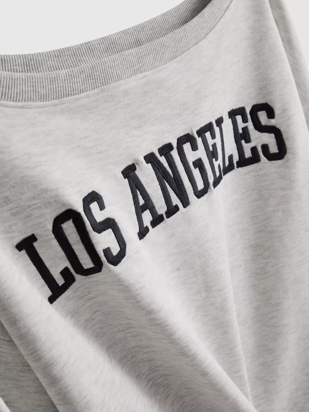 The Primark Scene | Sweatshirt med slogan og bare skuldre