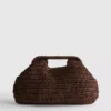 Vævet clutch