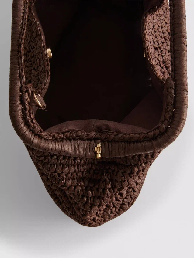 Vævet clutch