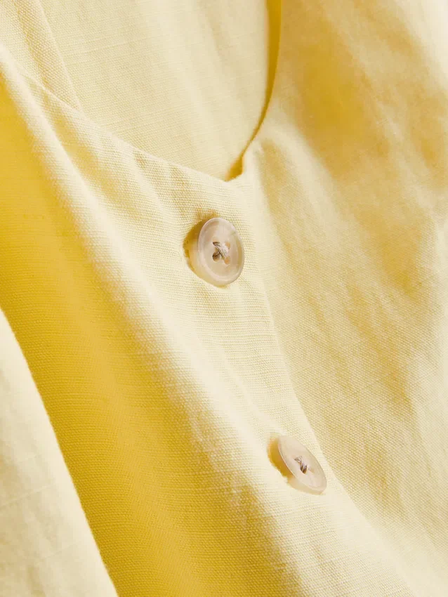 Vest i bomuldsblanding med knapper